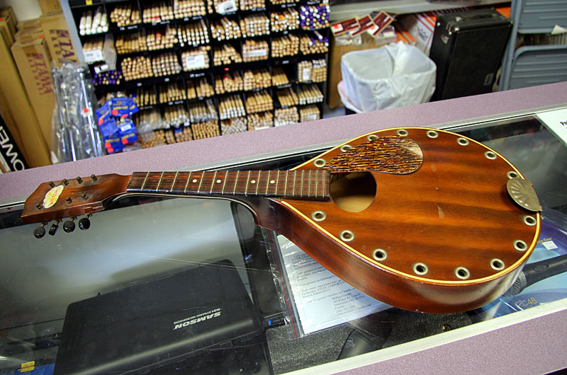 A 1930's Blue Comet Mandolin bought and played by my uncle Woody's father many years ago is in the shop for repairs.