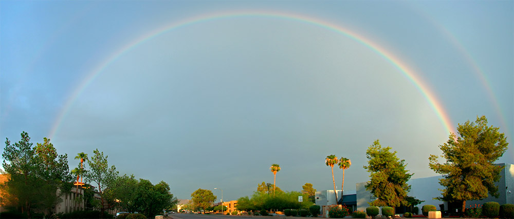 A rainbow with both sides visible over Scottsdale, Arizona