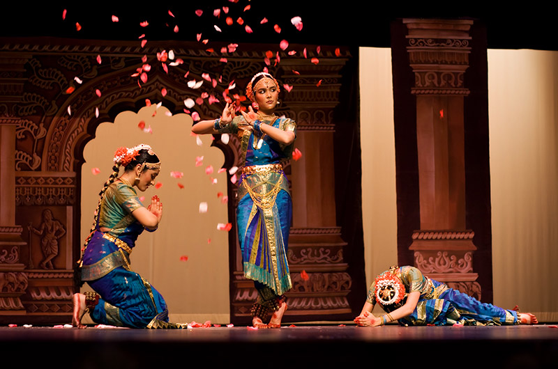 Hemangi, Poorvi, and Sachi performing a Varnam with scenes from the Bhagavad Gita during Arangetram in Phoenix, Arizona