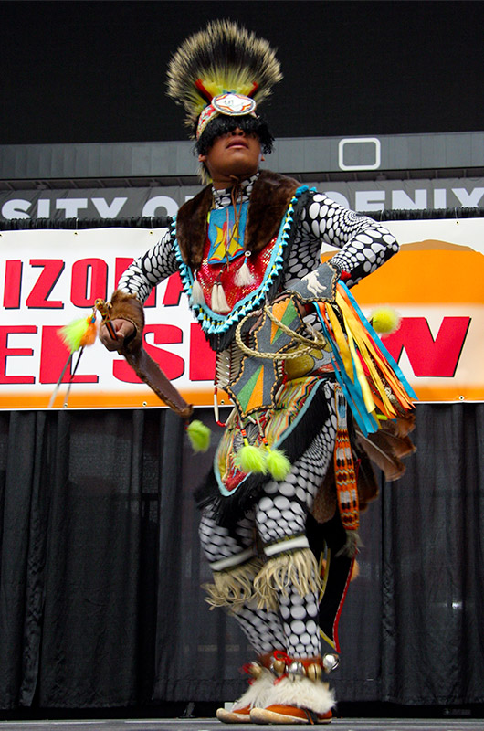 Native American performing the chicken dance