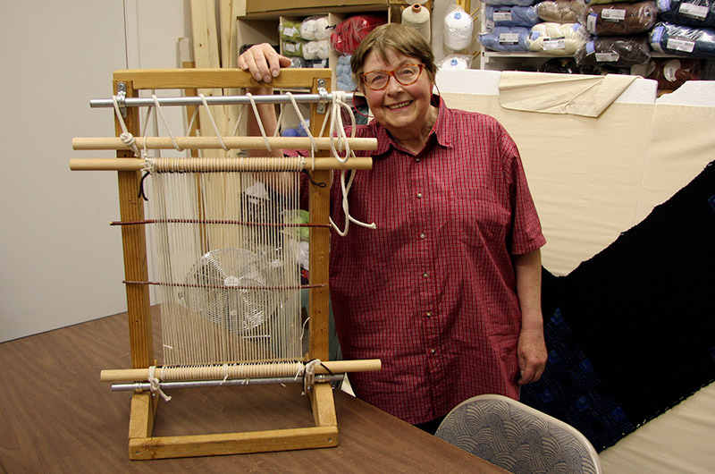 Jutta Engelhardt at Fiber Factory learning how to set up the loom for making a Navajo weaving