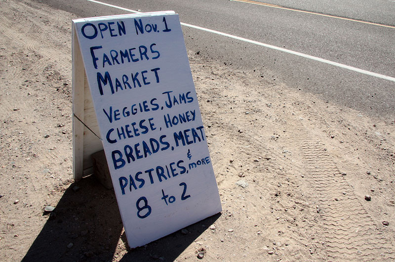 Sign announcing the opening of Tonopah Rob's Vegetable Farm in Tonopah, Arizona