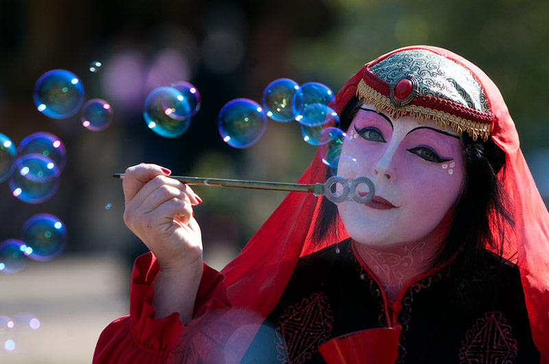 Performer blowing bubbles at the Arizona Renaissance Festival February 2010