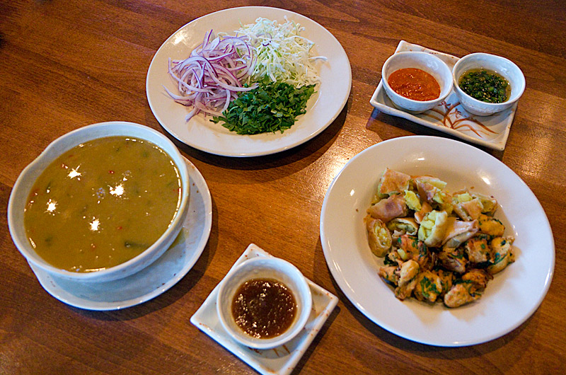 Burmese bean soup with somasa, a fried crunchy veggie thing and condiments from Little Rangoon restaurant in Scottsdale, Arizona