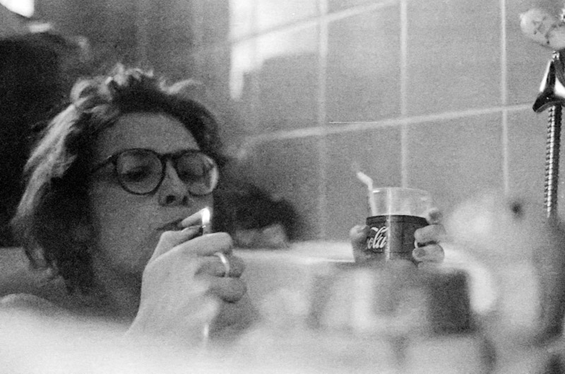 Caroline Engelhardt in her bathtub having a cigarette. Frankfurt, Germany 1989