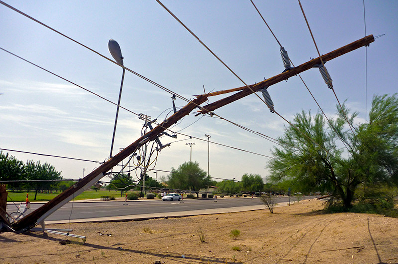 Broken electricity pole in Phoenix, Arizona. A storm the night before brought in a wind shear that decapitated more than a dozen power transmission poles.