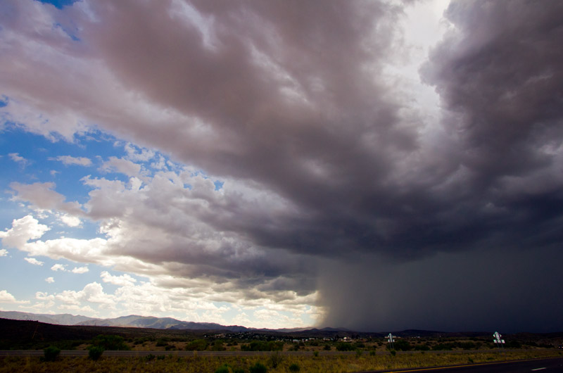 Storm clouds and heavy rain contrasted agains a blue sky that is quickly disappearing as I approach Prescott, Arizona