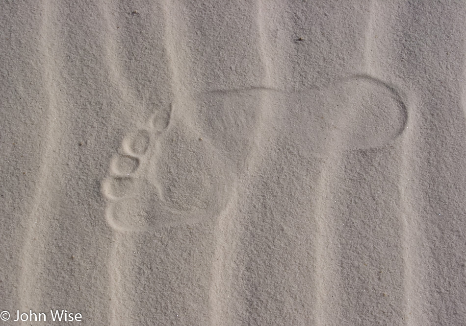Caroline Wise leaves a footprint at White Sands National Monument, New Mexico
