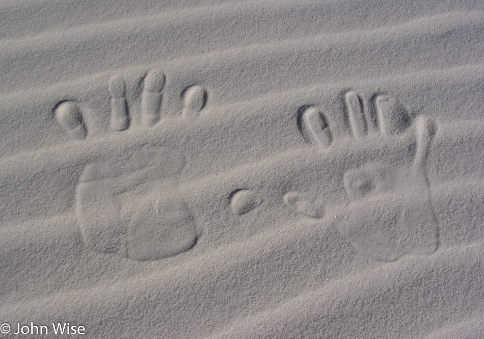 John Wise and Caroline Wise's hand prints in the sand at White Sands National Monument, New Mexico