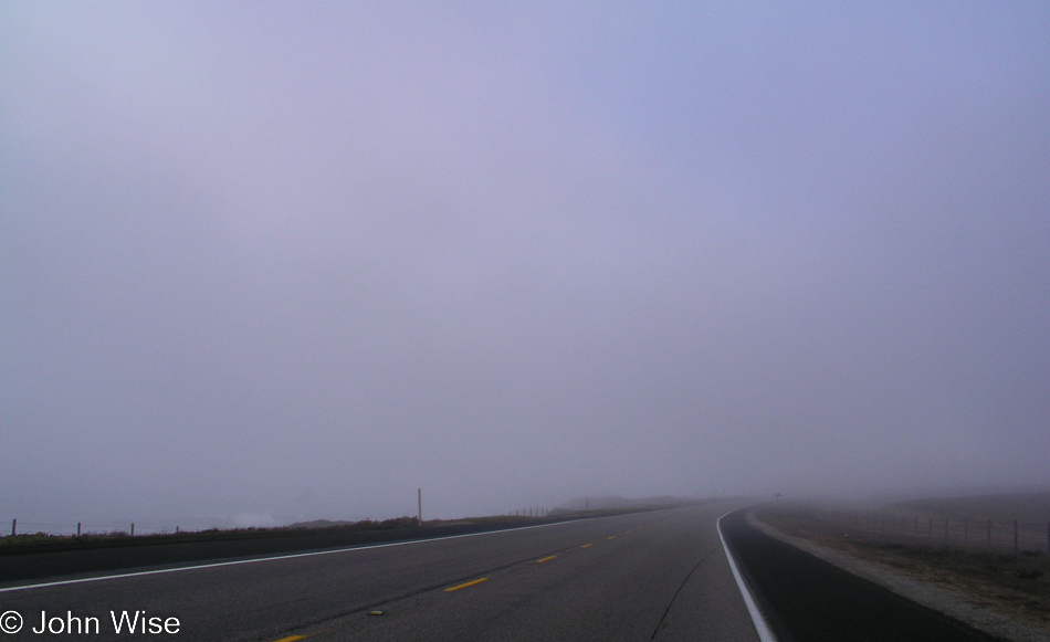 Foggy Highway 1 going north near San Simeon, California