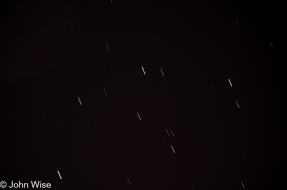My first long exposure of the night sky right from our driveway, only three of the stars were visible to the eye