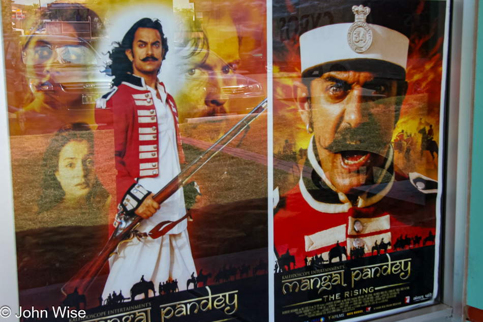 The poster for The Rising, a new Bollywood film starring Aamir Khan in the window of the local Indian grocery Indo Euro in Phoenix, Arizona