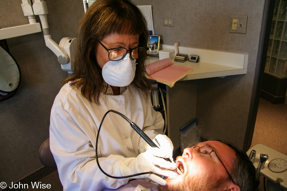 Under the dental instruments of the world's best dental hygienist in Arizona