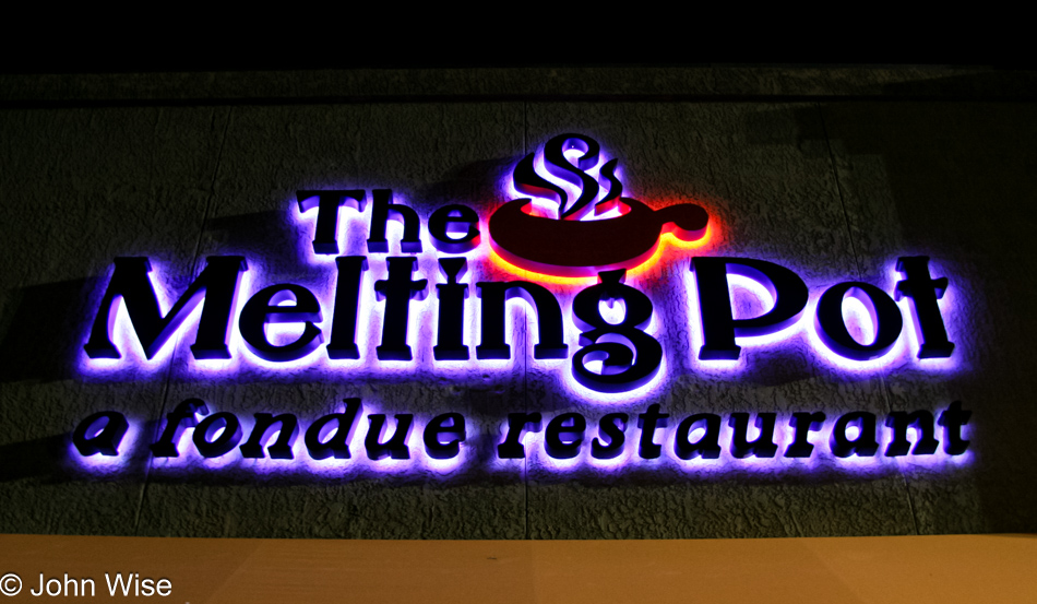 The sign identifying The Melting Pot in Tucson, Arizona
