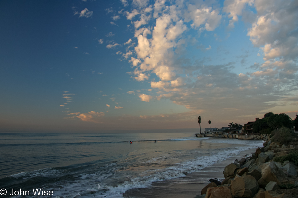 Near Seacliff south of Santa Barbara we stopped at dawn along the Pacific coast for this gorgeous orange slice of sunrise sandwiched between a light blue sky and the still dark ocean