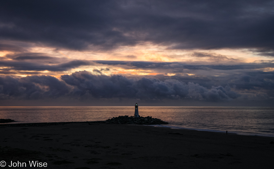 Sunrise looking out over a lighthouse in Santa Cruz, California