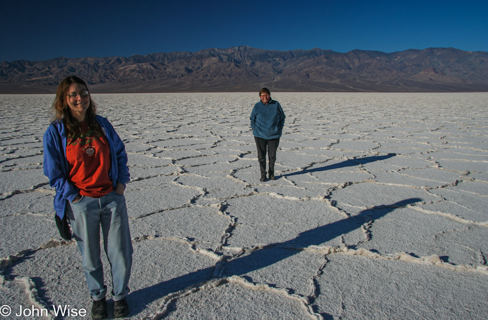 Caroline Wise and Jutta Engelhardt on the salt flat in Death Valley National Park at sunrise