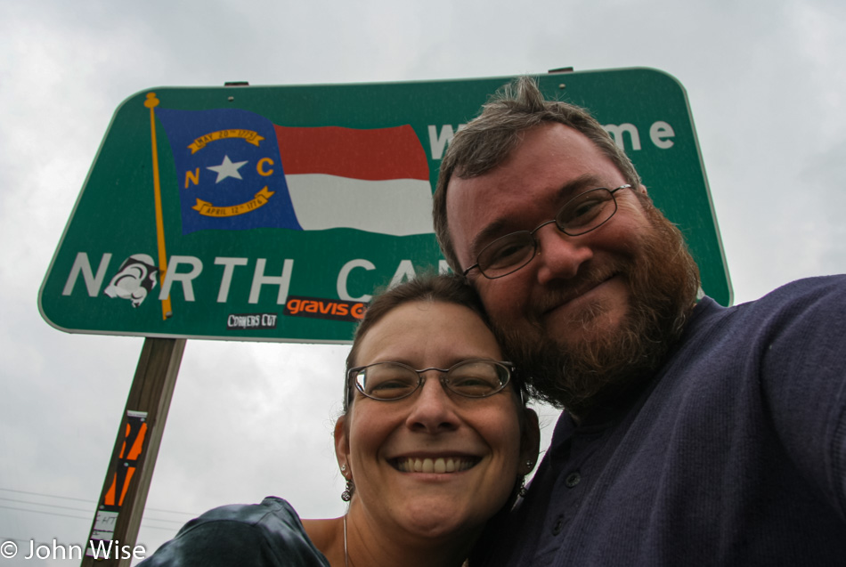 Caroline Wise and John Wise in front of the North Carolina State line