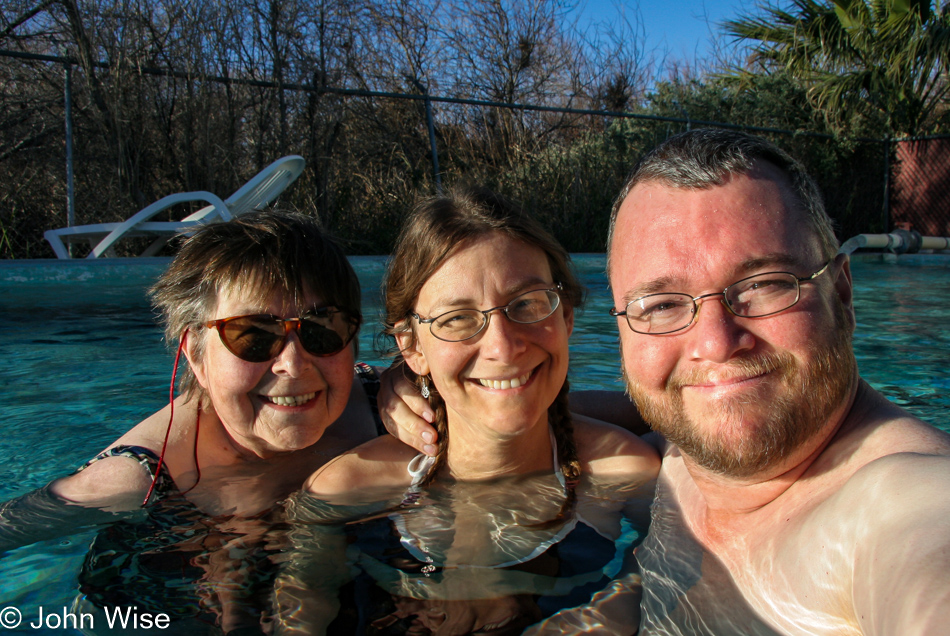 Jutta Engelhardt, Caroline Wise, and John Wise in the hot spring pool of Shoshone Inn in Shoshone, California