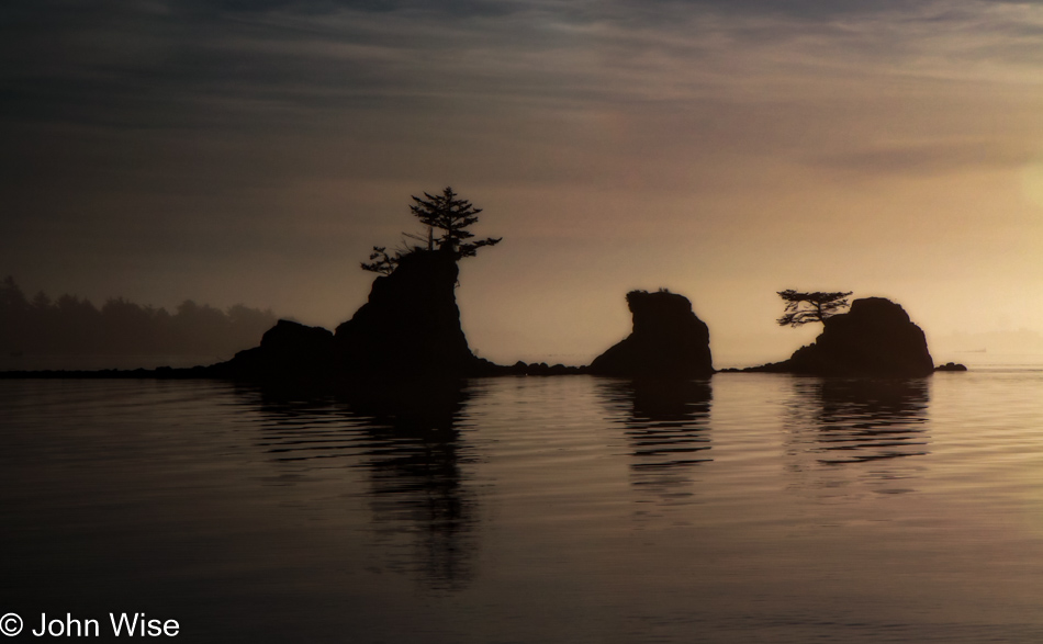 Rocks rising above the water in Siletz Bay, Oregon