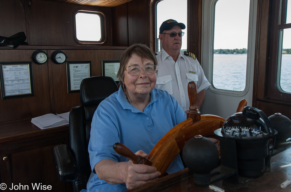 Jutta Engelhardt piloting a tour boat on Chesapeake Bay in Maryland