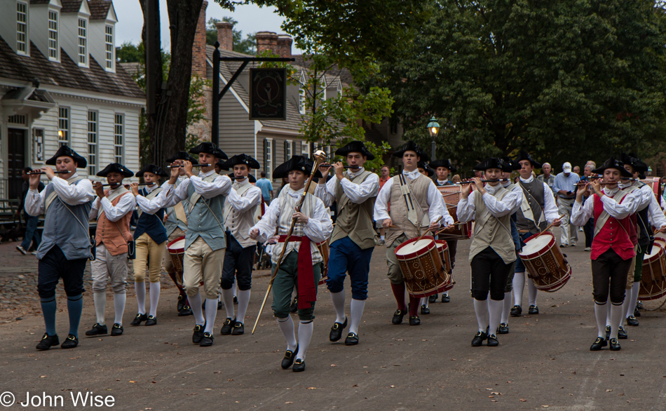 A fife and drum marching band on parade up Main Street in Colonial Williasmburg, Virginia