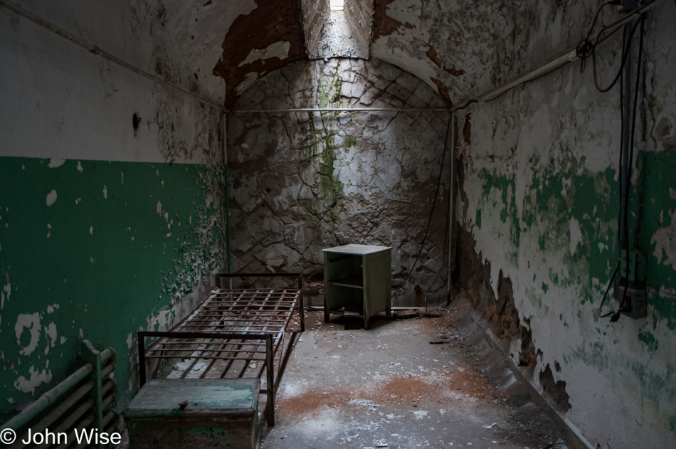 Inside a crumbling jail cell at Eastern State Penitentiary in Philadelphia, Pennsylvania