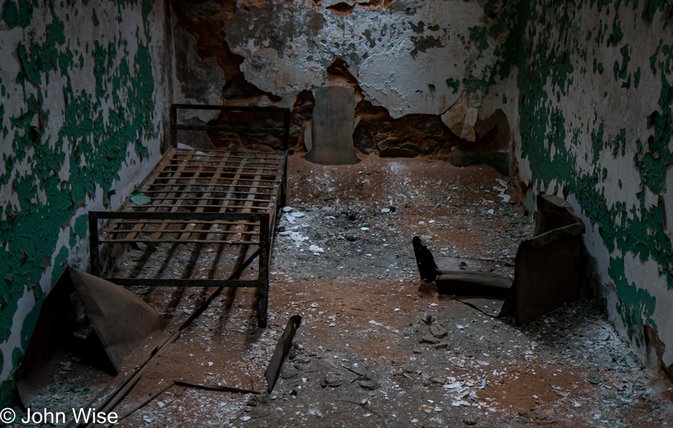 Inside a crumbling jail cell at Eastern State Penitentiary in Philadelphia, Pennsylvania