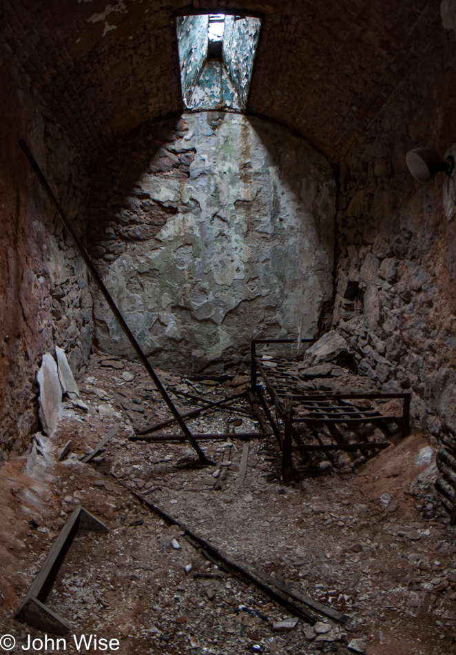 Inside a crumbling jail cell at Eastern State Penitentiary in Philadelphia, Pennsylvania