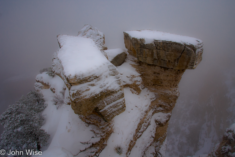 Snow covered rocks at Mather Point in the Grand Canyon National Park on December 12, 2009