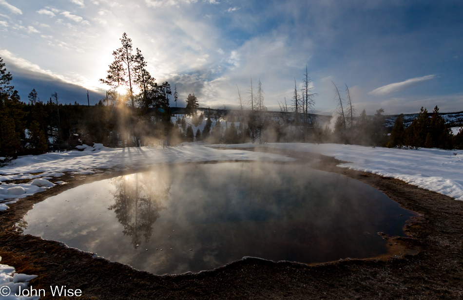 Morning Glory hot spring late in the afternoon on the Upper Geyser Basin in Yellowstone National Park January 2010