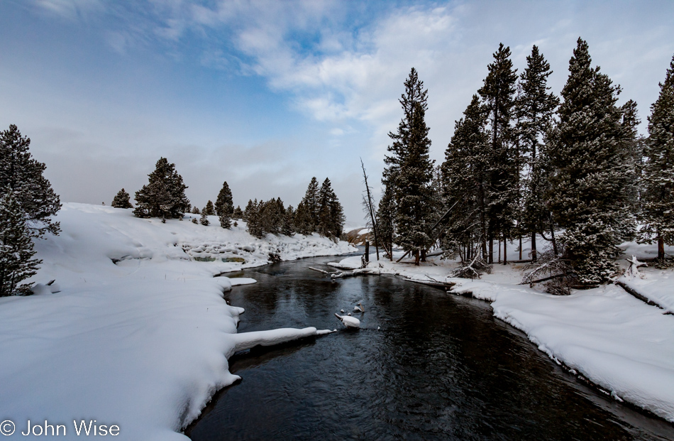 The Firehole River looking west on the Upper Geyser Basin just north of Old Faithful Geyser in Yellowstone National Park January 2010