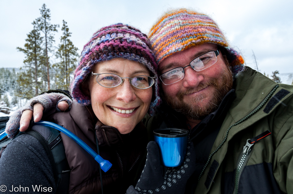 Caroline Wise and John Wise in front of Morning Glory Pool on the Upper Geyser Basin in Yellowstone National Park January 2010