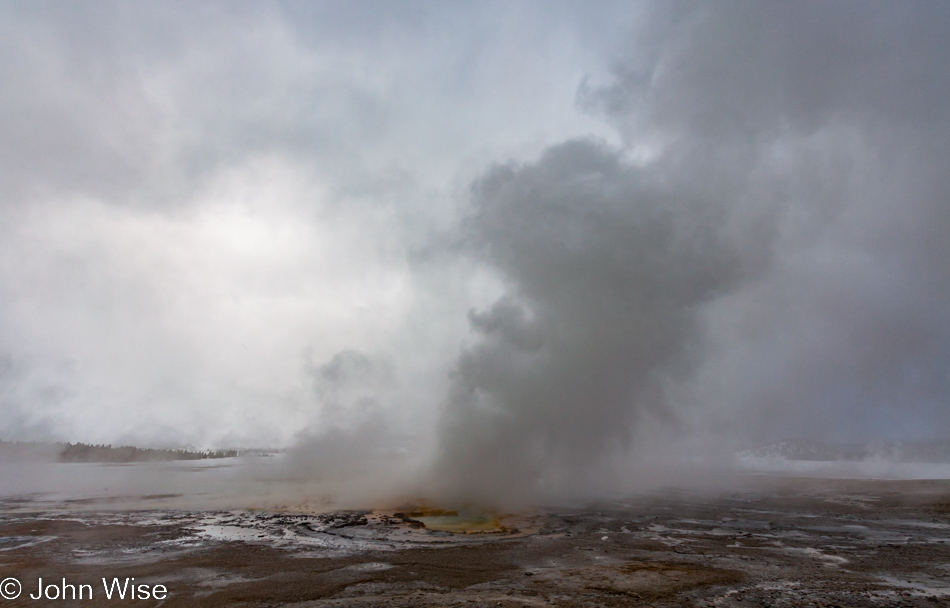 Clepsydra Geyser erupting in the afternoon on the Lower Geyser Basin in Yellowstone National Park January 2010