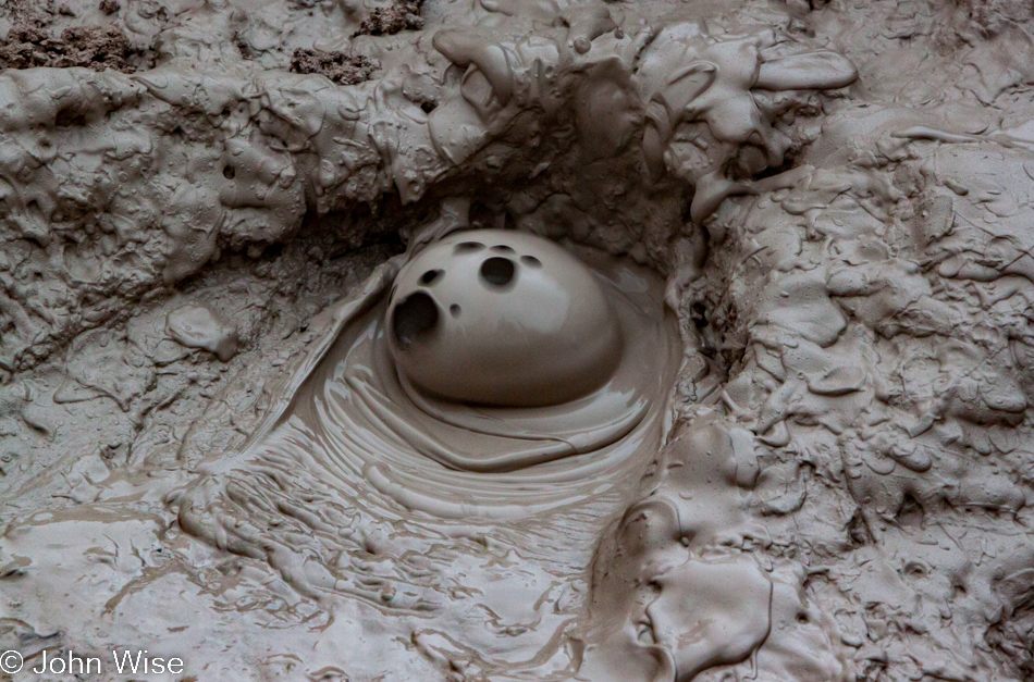 A bubble of mud about to pop at an unnamed mud pot on the Upper Geyser Basin in Yellowstone National Park January 2010