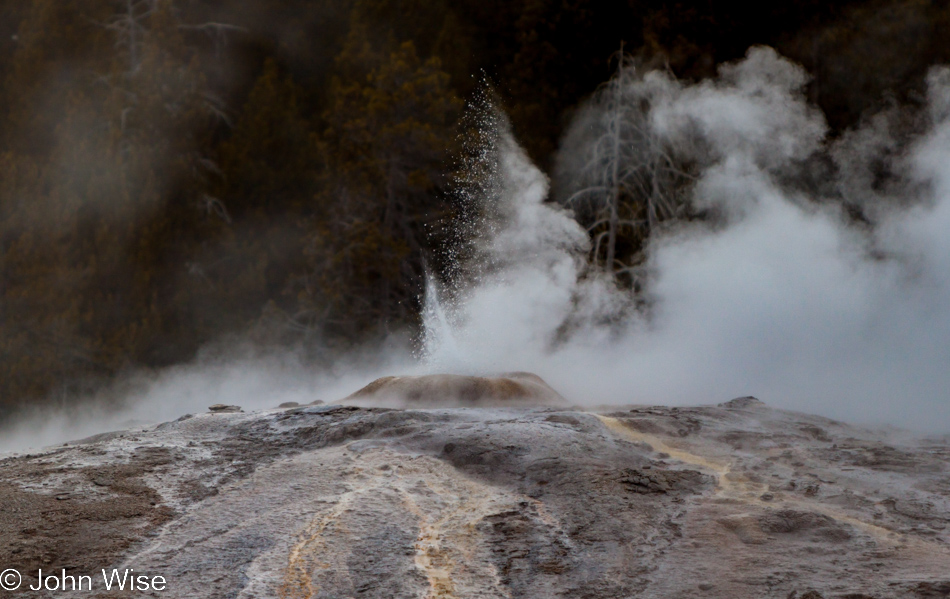 A small eruption at the Lion Group on the Upper Geyser Basin in Yellowstone National Park January 2010