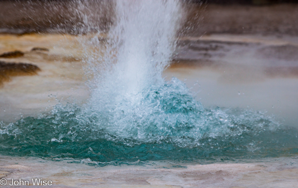 Sawmill Geyser erupting on the Upper Geyser Basin in Yellowstone National Park January 2010