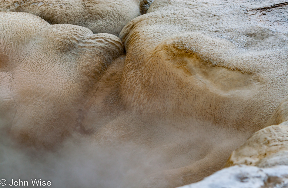 Close-up detail of the empty pool at Spasmodic Geyser on the Upper Geyser Basin in Yellowstone National Park January 2010