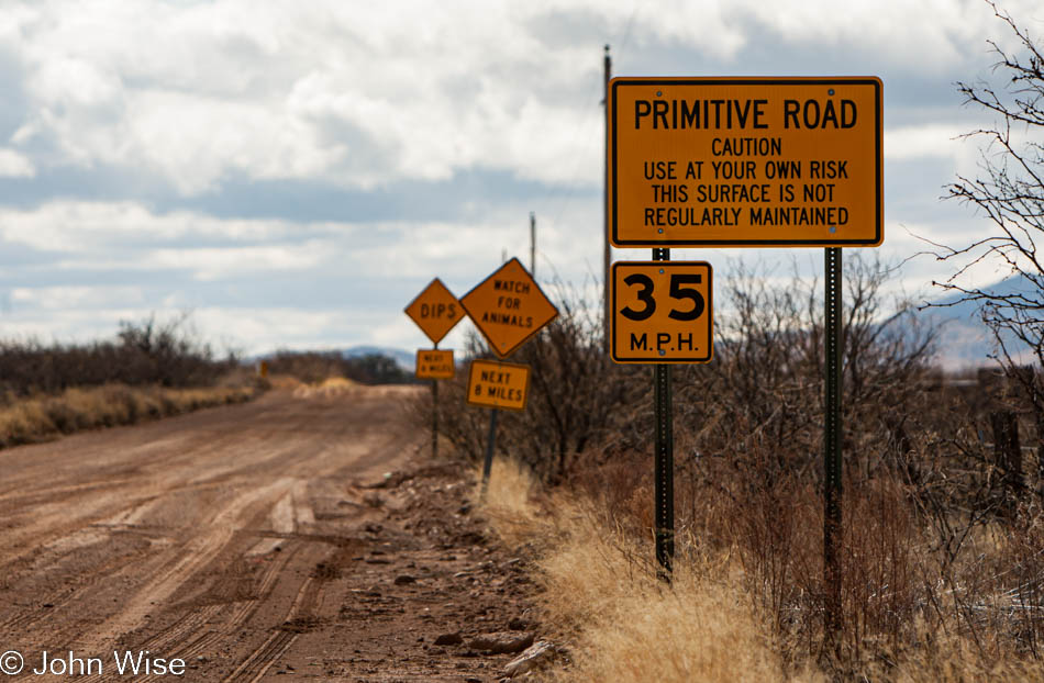 Signs along a dirt road in southern Arizona