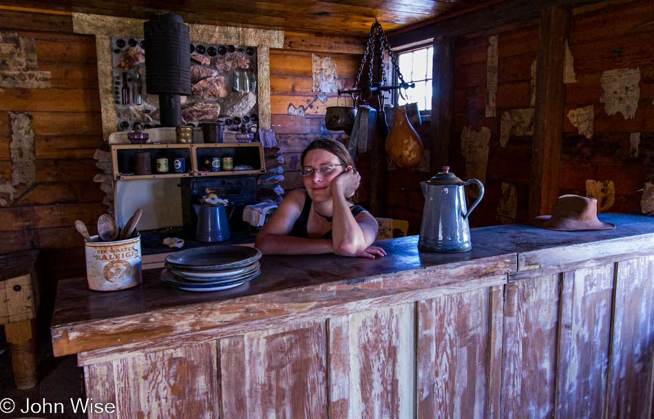 Caroline Wise at the bar in a kitchen at Castle Dome Ghost Town in western Arizona