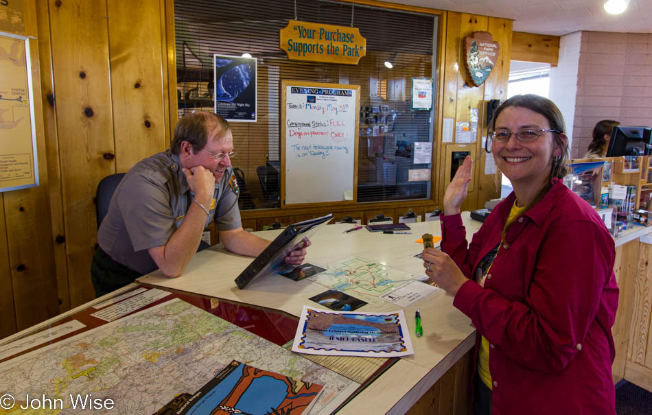 Caroline Wise getting her Junior Ranger Badge at Natural Bridges National Monument, Utah