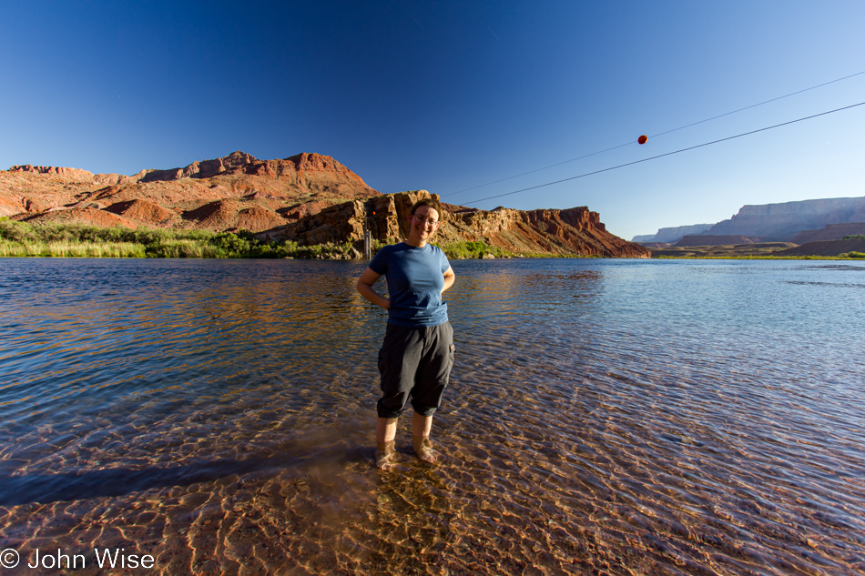 Caroline Wise standing in the Colorado river at Lee's Ferry north of the Grand Canyon National Park in Arizona