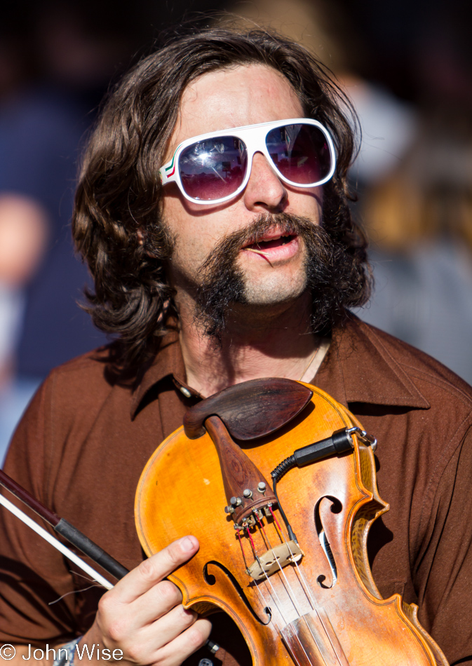 Musician performing on 4th Avenue at the 41st Annual Arts & Craft Street Fair in Tucson, Arizona