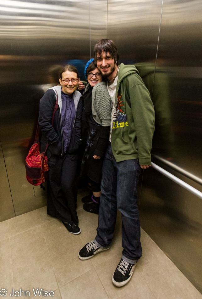 Caroline Wise, Rainy Heath, and Joe Cunningham in an elevator across the street from Hotel Congress in Tucson, Arizona