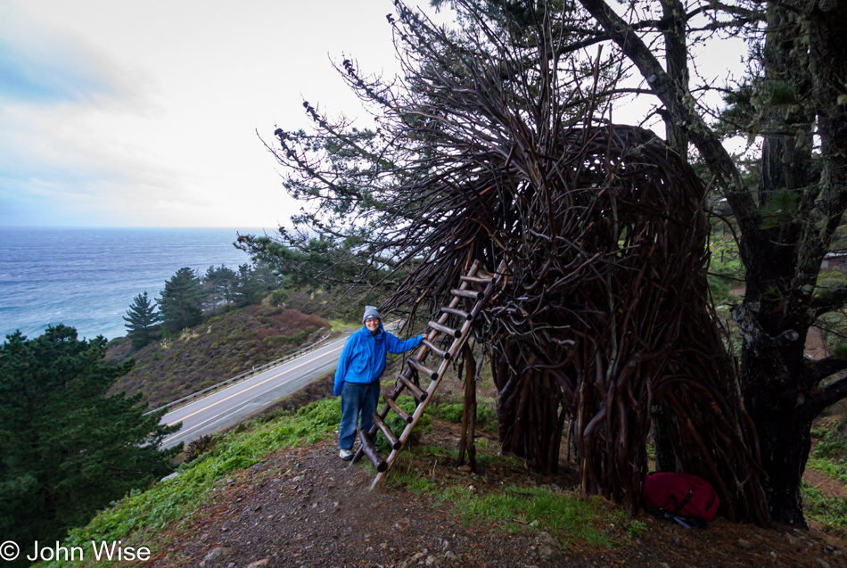 Caroline Wise outside the Nest on a rainy windy day at Treebones Resort in Big Sur, California
