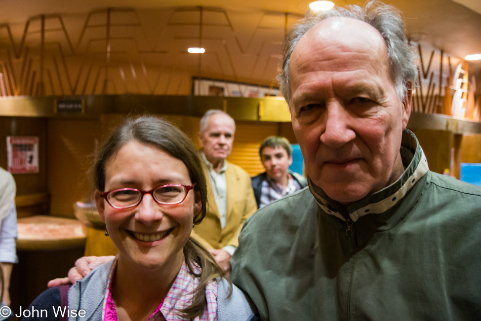 Caroline Wise and Werner Herzog in Tempe, Arizona with Cormac McCarthy in the background following a talk by Stephen Hawking