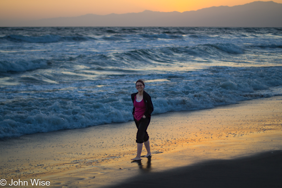 Caroline Wise walking on the beach in Marina Del Rey, California