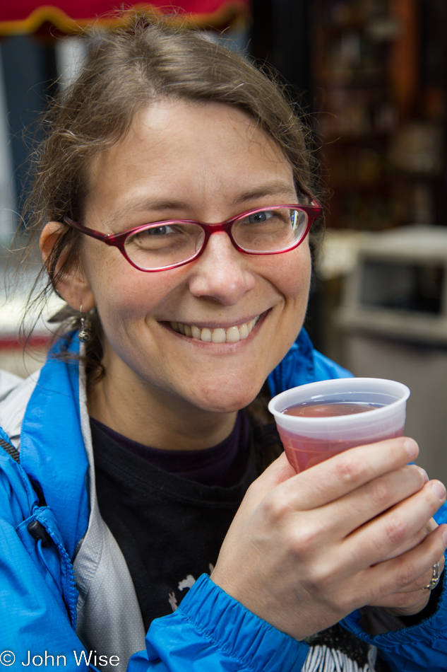Caroline Wise enjoying cinnamon spiced hot cranberry juice at the Jean-Talon Market in Montreal, Canada