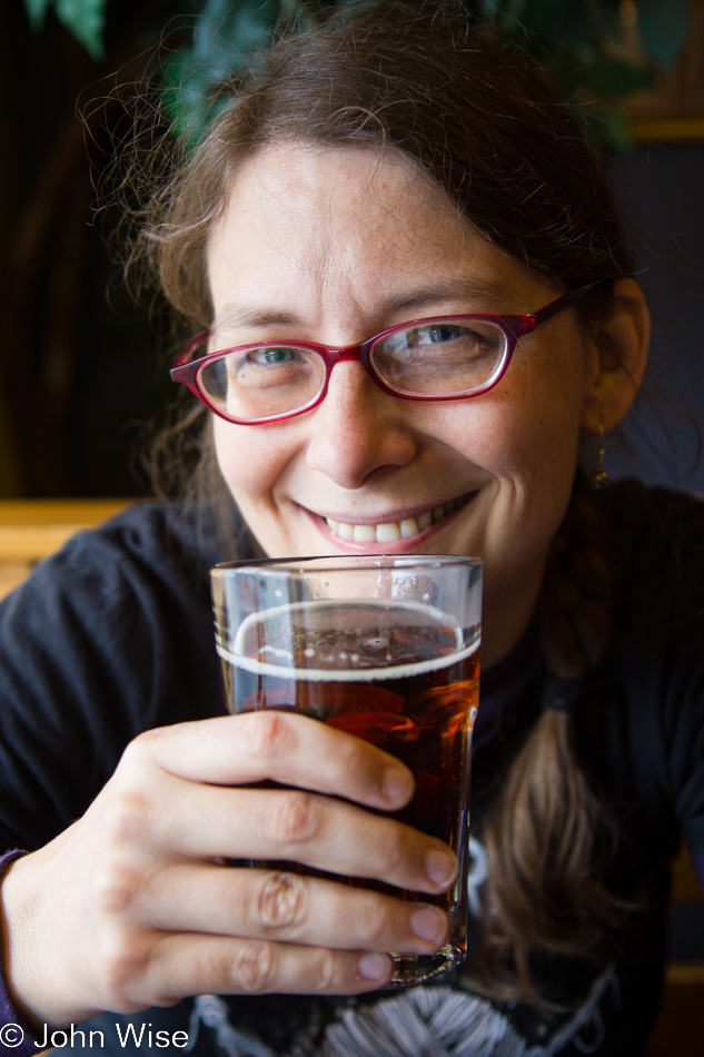 Caroline Wise enjoying a glass of Boreal beer at La Banquise in Montreal, Canada