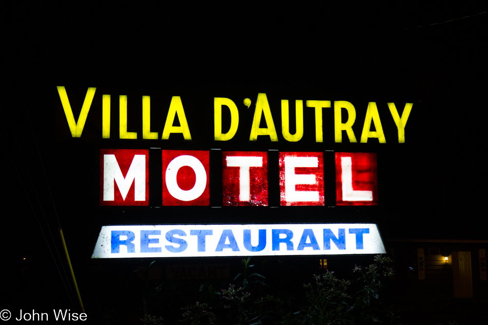 The illuminated sign for Motel Villa D'Autray in Lanoraie, Canada
